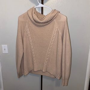 Tan turtleneck sweater